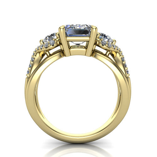 Amara emerald three stone engagement ring in 18K Yellow Gold, through-finger front profile showing the three-stone head raised above the woven split band