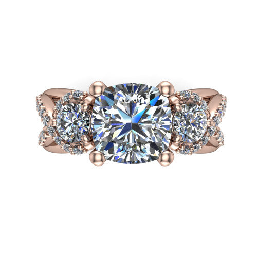 Amara cushion three stone engagement ring in 14K Rose Gold, top-down view showing the center diamond flanked by two round side stones woven into a pav&eacute; infinity twist