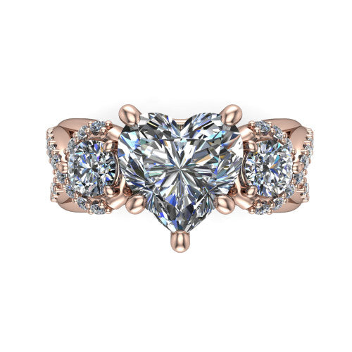 Amara heart three stone engagement ring in 14K Rose Gold, top-down view showing the center diamond flanked by two round side stones woven into a pav&eacute; infinity twist
