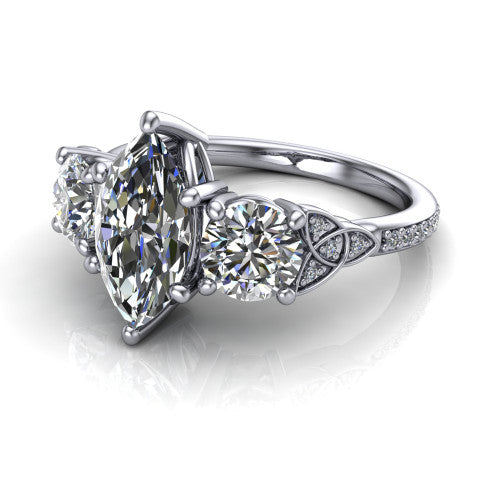 Zion marquise three stone engagement ring in 18K White Gold, three-quarter perspective showing the center diamond between two round side stones with Celtic trinity-knot shoulders above a pav&eacute; shank