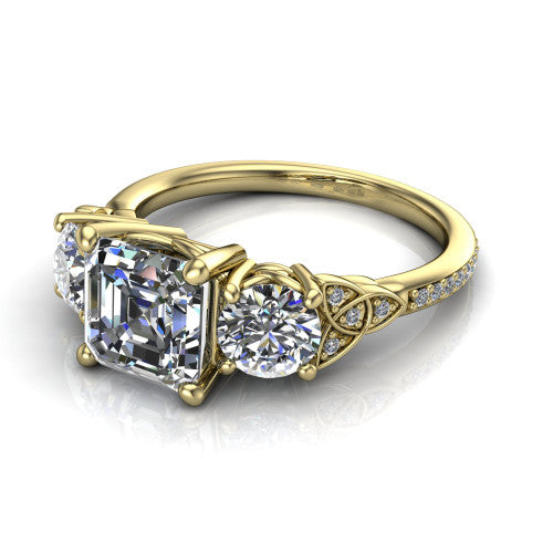 Zion asscher three stone engagement ring in 14K Yellow Gold, three-quarter perspective showing the center diamond between two round side stones with Celtic trinity-knot shoulders above a pav&eacute; shank