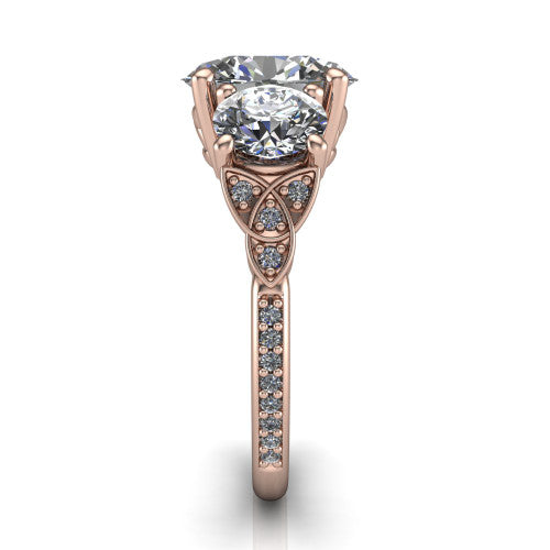 Zion oval three stone engagement ring in 18K Rose Gold, side profile showing the trinity-knot shoulder and the pav&eacute; diamonds running down the shank