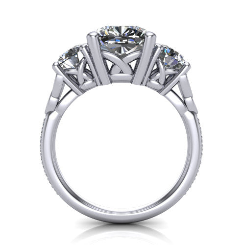 Zion cushion three stone engagement ring in 18K White Gold, through-finger front profile showing the three-stone head raised above the Celtic knot shoulders and pav&eacute; band