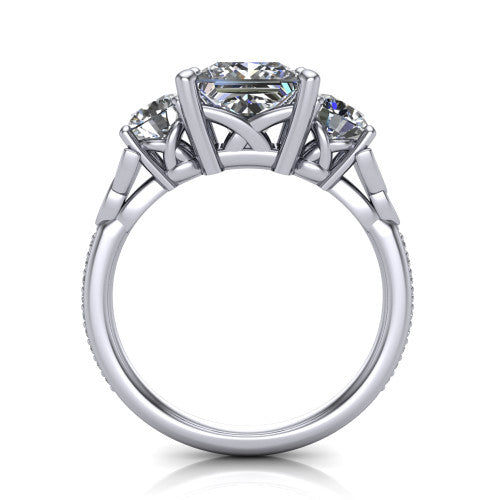 Zion princess three stone engagement ring in 18K White Gold, through-finger front profile showing the three-stone head raised above the Celtic knot shoulders and pav&eacute; band