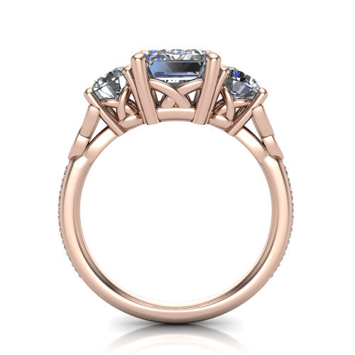 Zion emerald three stone engagement ring in 18K Rose Gold, through-finger front profile showing the three-stone head raised above the Celtic knot shoulders and pav&eacute; band