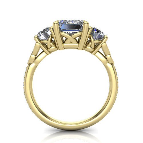 Zion emerald three stone engagement ring in 14K Yellow Gold, through-finger front profile showing the three-stone head raised above the Celtic knot shoulders and pav&eacute; band