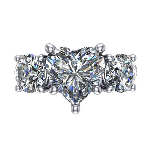 Zion heart three stone engagement ring in 18K White Gold, top-down view showing the center diamond flanked by two round side stones and trinity-knot shoulder detailing