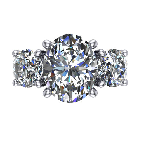 Zion oval three stone engagement ring in 14K White Gold, top-down view showing the center diamond flanked by two round side stones and trinity-knot shoulder detailing