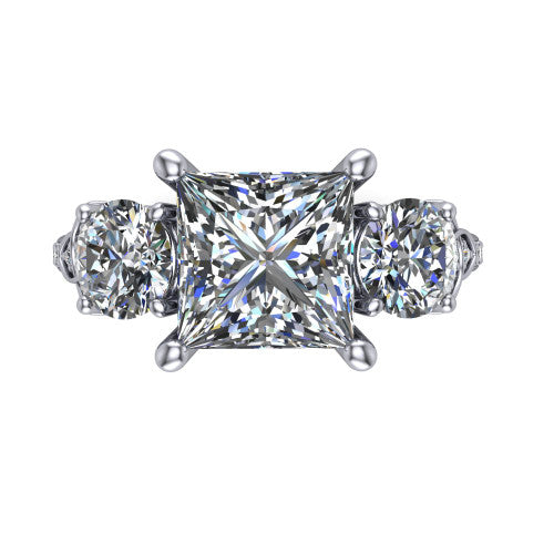 Zion princess three stone engagement ring in 14K White Gold, top-down view showing the center diamond flanked by two round side stones and trinity-knot shoulder detailing