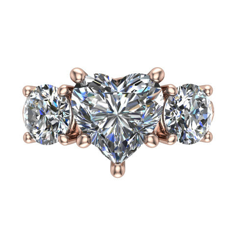 Zion heart three stone engagement ring in 18K Rose Gold, top-down view showing the center diamond flanked by two round side stones and trinity-knot shoulder detailing