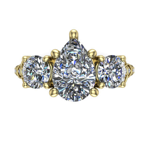 Zion pear three stone engagement ring in 14K Yellow Gold, top-down view showing the center diamond flanked by two round side stones and trinity-knot shoulder detailing