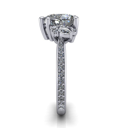 Mila heart three stone engagement ring in 14K White Gold, side profile showing the round accent cluster and the pav&eacute; diamonds running down the shank