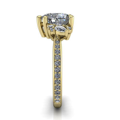 Mila heart three stone engagement ring in 14K Yellow Gold, side profile showing the round accent cluster and the pav&eacute; diamonds running down the shank