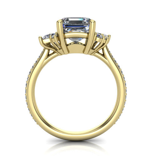 Mila asscher three stone engagement ring in 14K Yellow Gold, through-finger front profile showing the center head raised above the round accent clusters and pav&eacute; band