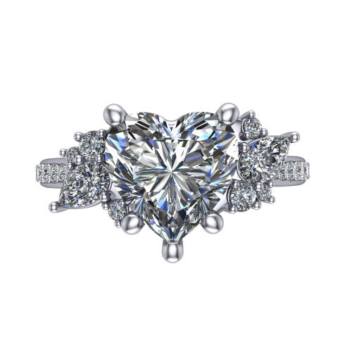 Mila heart three stone engagement ring in 14K White Gold, top-down view showing the center diamond between two trios of round accent diamonds