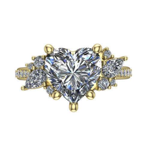 Mila heart three stone engagement ring in 14K Yellow Gold, top-down view showing the center diamond between two trios of round accent diamonds