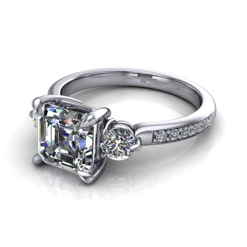 Blake asscher three stone engagement ring in 18K White Gold, three-quarter perspective showing the center diamond between two round side stones above a pav&eacute; shank