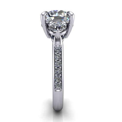 Blake round three stone engagement ring in 14K White Gold, through-finger front profile showing the three-stone head raised above the pav&eacute; band