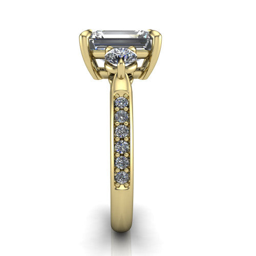 Blake emerald three stone engagement ring in 14K Yellow Gold, through-finger front profile showing the three-stone head raised above the pav&eacute; band