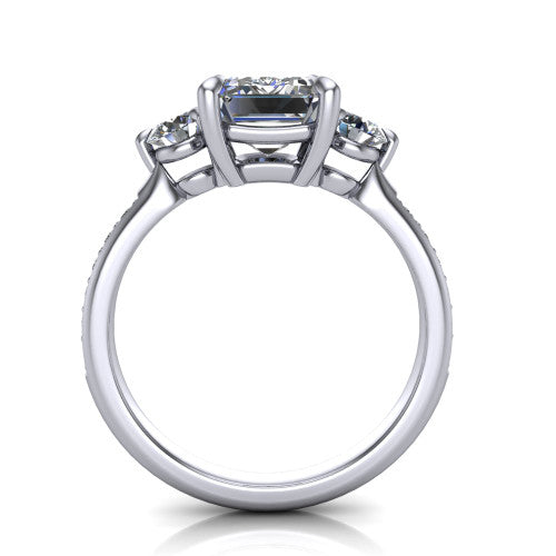 Blake emerald three stone engagement ring in 18K White Gold, through-finger front profile showing the three-stone head raised above the pav&eacute; band
