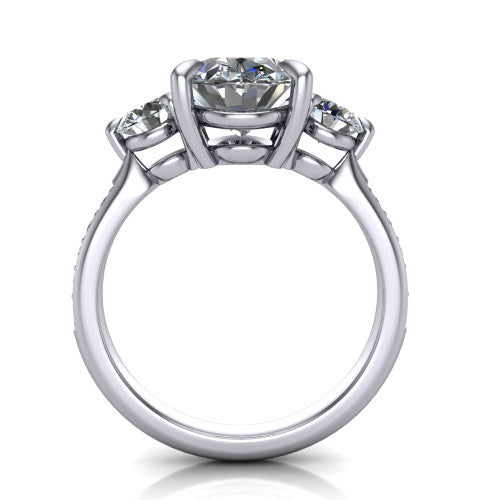 Blake oval three stone engagement ring in Platinum, through-finger front profile showing the three-stone head raised above the pav&eacute; band
