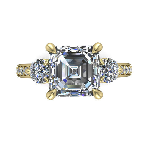 Blake asscher three stone engagement ring in 18K Yellow Gold, top-down view showing the center diamond flanked by two round side stones in a classic three stone setting
