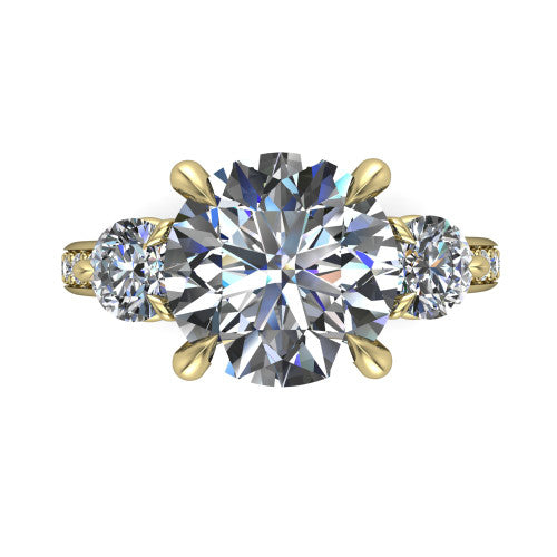 Blake round three stone engagement ring in 14K Yellow Gold, through-finger front profile showing the three-stone head raised above the pav&eacute; band
