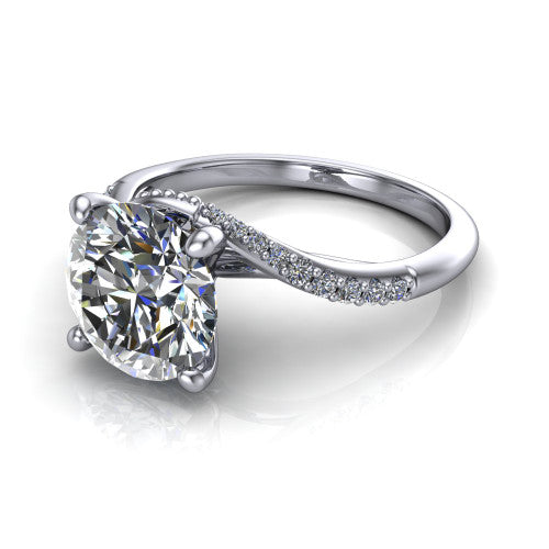 Aurora round classic engagement ring in Platinum, three-quarter perspective showing the solitaire center diamond above a twisting pav&eacute; bypass shank
