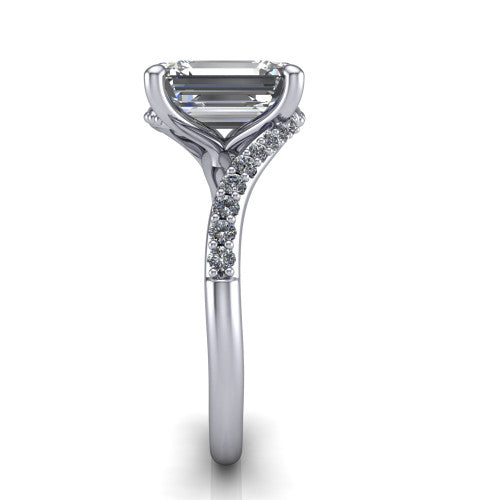 Aurora emerald classic engagement ring in Platinum, side profile showing the bypass shank crossing under the head into a diamond-lined band