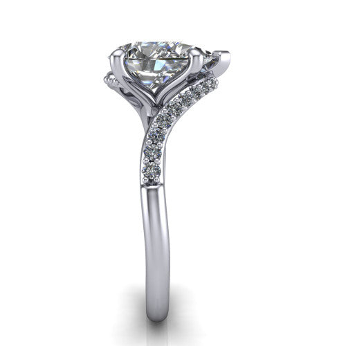 Aurora pear classic engagement ring in Platinum, side profile showing the bypass shank crossing under the head into a diamond-lined band
