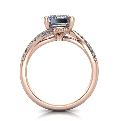 Aurora emerald classic engagement ring in 18K Rose Gold, through-finger front profile showing the solitaire head raised above the twisting pav&eacute; band