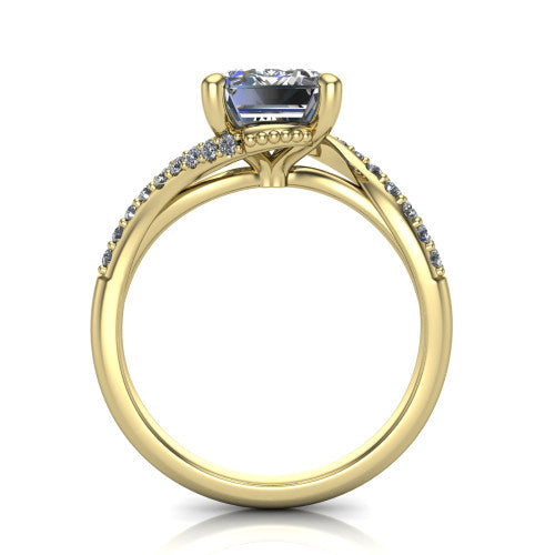 Aurora emerald classic engagement ring in 18K Yellow Gold, through-finger front profile showing the solitaire head raised above the twisting pav&eacute; band