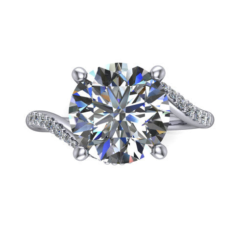 Aurora round classic engagement ring in 18K White Gold, top-down view showing the prong-set center diamond where the pav&eacute; bypass shank crosses beneath the head