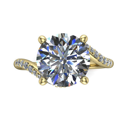 Aurora round classic engagement ring in 18K Yellow Gold, top-down view showing the prong-set center diamond where the pav&eacute; bypass shank crosses beneath the head