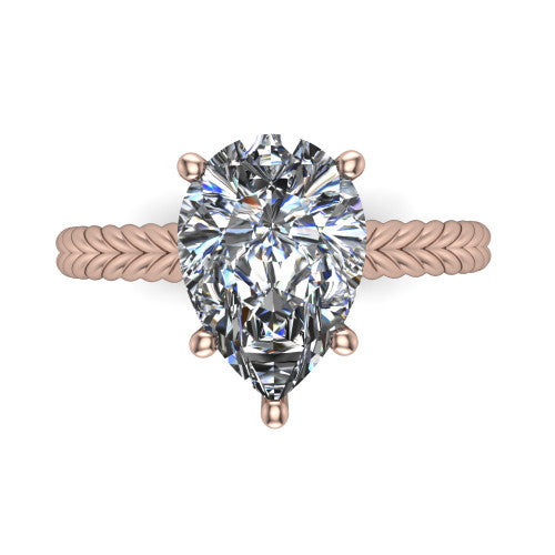 Jayden pear classic engagement ring in 18K Rose Gold, top-down view showing the prong-set center diamond over a braided rope band