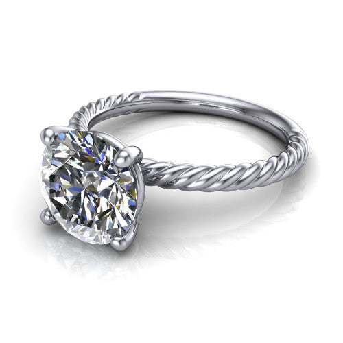 Nova round rope solitaire engagement ring in 18K White Gold, three-quarter perspective showing the round center on claw prongs above a twisted rope band