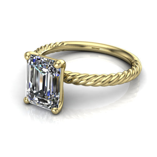 Nova emerald rope solitaire engagement ring in 14K Yellow Gold, three-quarter perspective showing the emerald center on claw prongs above a twisted rope band