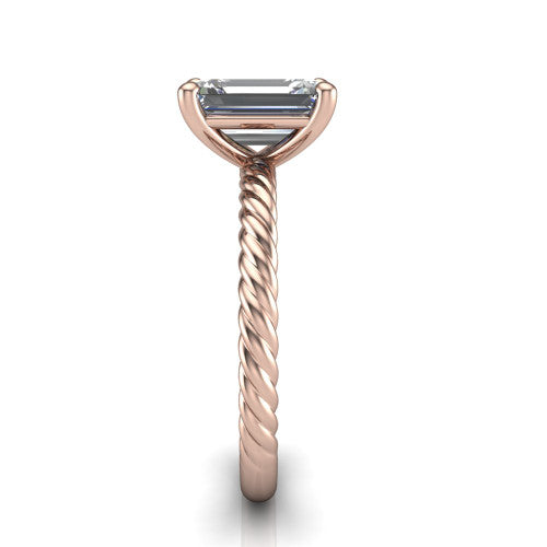Nova emerald rope solitaire engagement ring in 14K Rose Gold, side profile showing the twisted rope band and the open basket beneath the emerald center