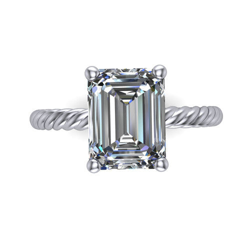 Nova emerald rope solitaire engagement ring in Platinum, top-down view showing the emerald center and the braided rope shank