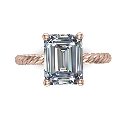 Nova emerald rope solitaire engagement ring in 18K Rose Gold, top-down view showing the emerald center and the braided rope shank