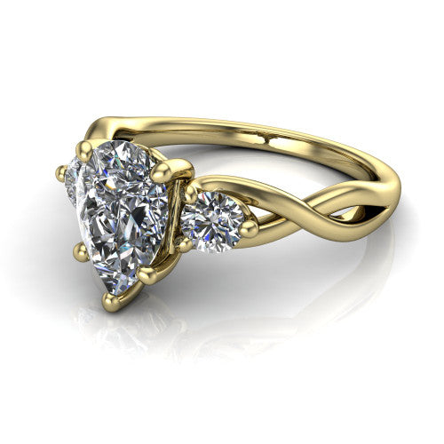 Alina pear three stone engagement ring in 18K Yellow Gold, three-quarter perspective showing the pear center between two round side stones above a twisted vine band