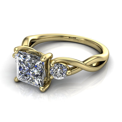 Alina princess three stone engagement ring in 18K Yellow Gold, three-quarter perspective showing the princess center between two round side stones above a twisted vine band