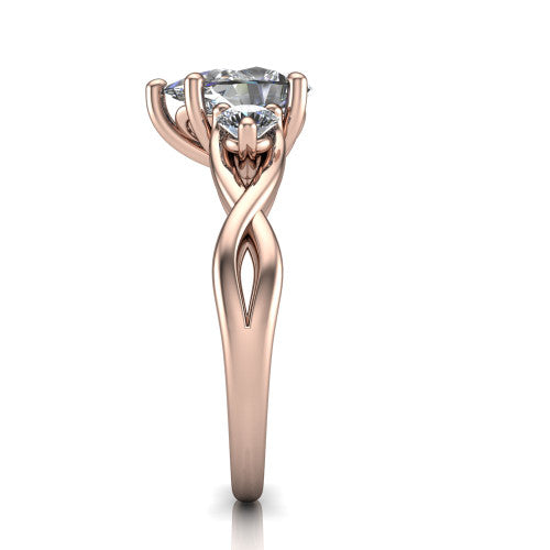 Alina pear three stone engagement ring in 14K Rose Gold, side profile showing the twisted infinity vine band sweeping to the pear center