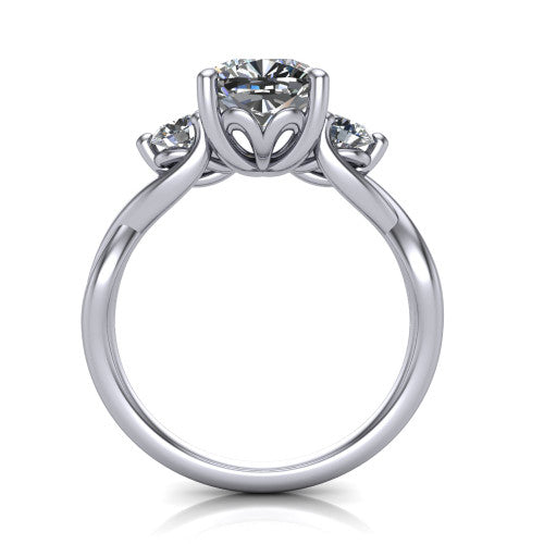 Alina cushion three stone engagement ring in Platinum, through-finger front profile showing the three-stone head and floral basket above the vine band