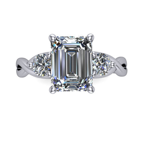 Alina emerald three stone engagement ring in 14K White Gold, top-down view showing the emerald center flanked by two round accent diamonds