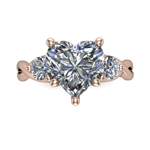 Alina heart three stone engagement ring in 14K Rose Gold, top-down view showing the heart center flanked by two round accent diamonds