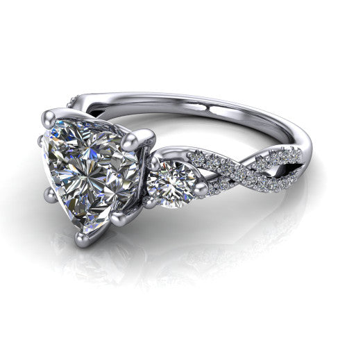 Ryleigh heart three stone engagement ring in 14K White Gold, three-quarter perspective showing the heart center between two round side stones above a twisted pav&eacute; band