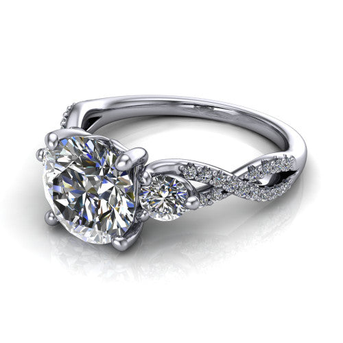 Ryleigh round three stone engagement ring in 14K White Gold, three-quarter perspective showing the round center between two round side stones above a twisted pav&eacute; band
