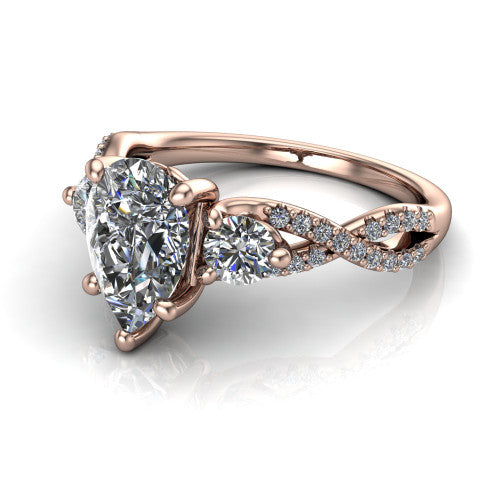 Ryleigh pear three stone engagement ring in 18K Rose Gold, three-quarter perspective showing the pear center between two round side stones above a twisted pav&eacute; band