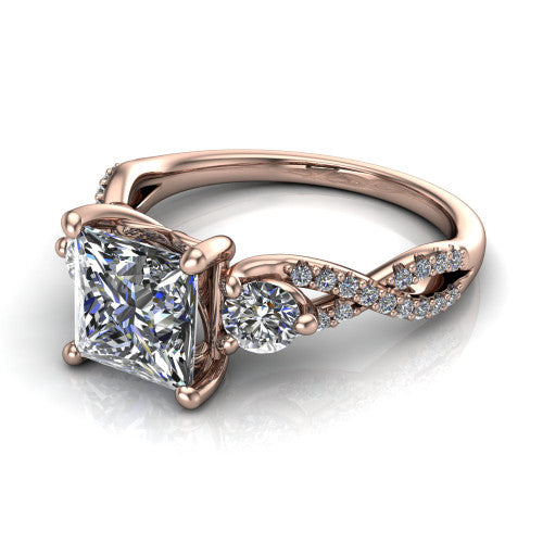 Ryleigh princess three stone engagement ring in 18K Rose Gold, three-quarter perspective showing the princess center between two round side stones above a twisted pav&eacute; band